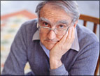 national whiners' day man wearing blue sweater looking unhappy