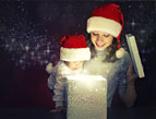 daily Devotion picture of christmas sheet music and a sprig of holly with berries