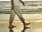 walking on the beach barefoot