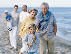 father, mother, and family on beach