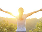 woman happy with the sunrise